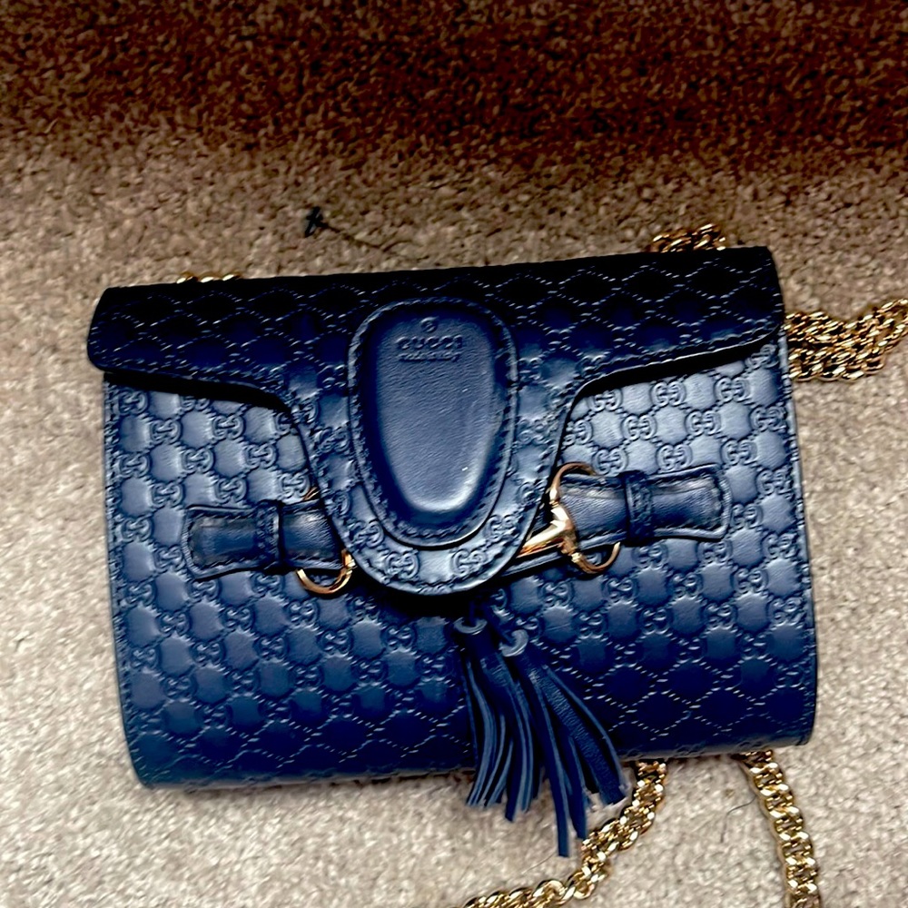 Navy Blue small Gucci bag . Has been worn a couple of times . 100% authentic